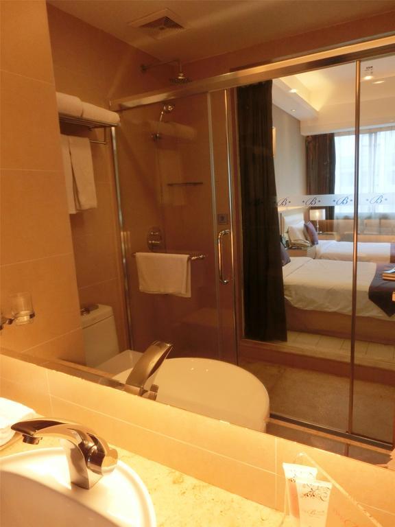 Guangzhou Bauhinia Hotel חדר תמונה